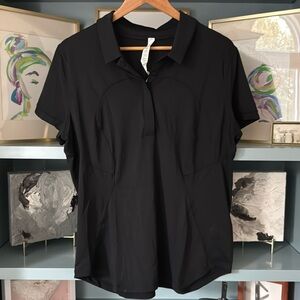 Lululemon women’s short sleeve, black polo, size 14
